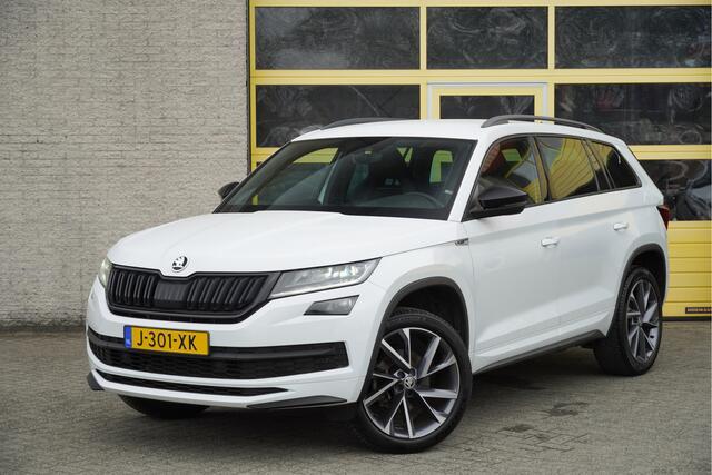Skoda Kodiaq 1.5 TSI 150PK! Automaat Sportline Business BJ2020 Lmv 20" | Led V+A | Pdc | Achteruitrijcamera | App-Connect | Navi | Virtual cockpit | Climate control | Cruise control | Elek. Be stoel+Mem | Sportstoelen/Sportstuur | Verwarmde voorstoelen | Zwarte hemel