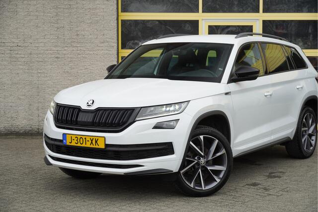 Skoda Kodiaq 1.5 TSI 150PK! Automaat Sportline Business BJ2020 Lmv 20" | Led V+A | Pdc | Achteruitrijcamera | App-Connect | Navi | Virtual cockpit | Climate control | Cruise control | Elek. Be stoel+Mem | Sportstoelen/Sportstuur | Verwarmde voorstoelen | Zwarte hemel