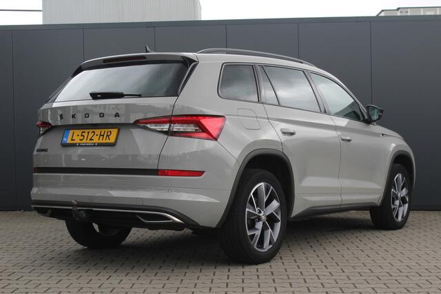Skoda Kodiaq 1.5 TSI Sportline Business | Incl. 12 maanden garantie | Trekhaak | Achteruitrijcamera | Stoelgeheugen | Stoel/stuurverwarming | Premium audio | Parkeersensoren | Cruise control | Climate control | Airco | Apple carplay/Andoid auto | Bluetooth | Lichtmeta