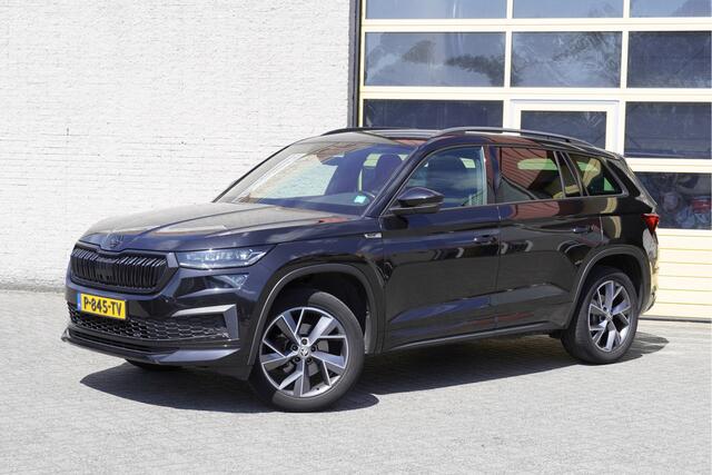 Skoda Kodiaq 1.5 TSI 150PK! Automaat Sportline Business BJ2022 Lmv | Led V+A | Pdc | Keyless | Elek. trekhaak | Elek. achterklep | Achteruitrijcamera | App-Connect | Navi | Virtual cockpit | Dashboard verlichting | Elek. Be stoel+Mem | Verwarmde voorstoelen | Nw-model