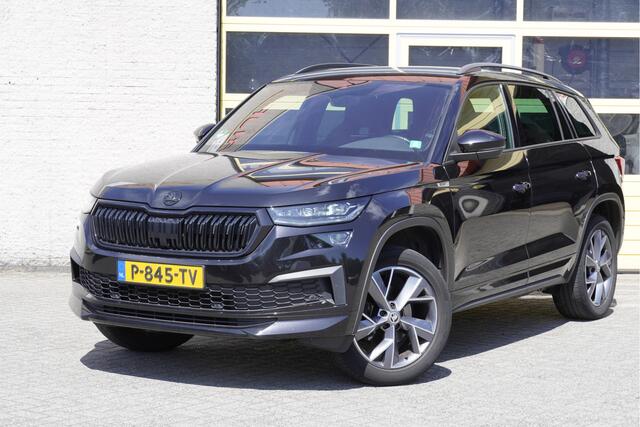 Skoda Kodiaq 1.5 TSI 150PK! Automaat Sportline Business BJ2022 Lmv | Led V+A | Pdc | Keyless | Elek. trekhaak | Elek. achterklep | Achteruitrijcamera | App-Connect | Navi | Virtual cockpit | Dashboard verlichting | Elek. Be stoel+Mem | Verwarmde voorstoelen | Nw-model