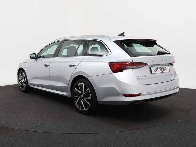 Skoda OCTAVIA Combi 1.4 TSI iV PHEV Business Edition Plus | LED | Stoelverw. | Memory | HUD | DAB | Standkachel | Keyless | Sfeerverlichting | Elek 04-2021 65.058 KM