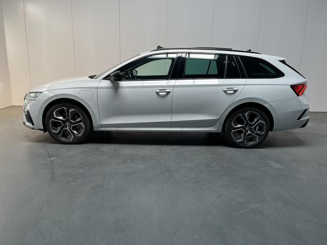 Skoda OCTAVIA Combi 1.4 TSI RS iV PHEV / AUTOMAAT/ 245 PK/ PANO/ ACC/ SMARTLINK/ PARK.SENSOR. + CAMERA/ STUUR+STOELVERWARM./ DCC/ HEAD-UP/ ELEK.ACHTERKLEP/ DODEHOEK/ CANTON AUDIO/ DIGITAL DASH/ NAVI/ DAB/ CLIMA/ LED