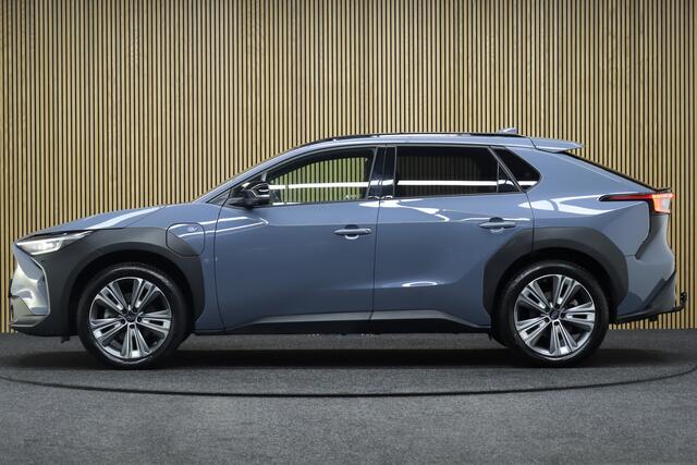 Subaru SOLTERRA Sky Package 71 kWh | Panoramadak | Adaptive-cruise | Trekhaak | 360° Camera | Navigatie | Elek. Achterklep | Leder | Stoel & Stuurverwarming | Apple Carplay & Android Auto | Keyless | Dodehoekdetectie