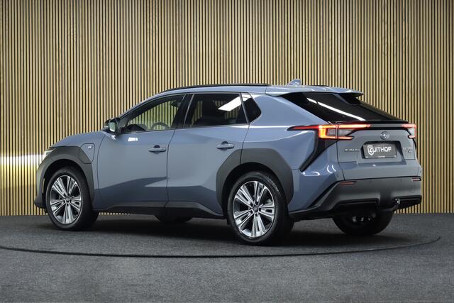 Subaru SOLTERRA Sky Package 71 kWh | Panoramadak | Adaptive-cruise | Trekhaak | 360° Camera | Navigatie | Elek. Achterklep | Leder | Stoel & Stuurverwarming | Apple Carplay & Android Auto | Keyless | Dodehoekdetectie