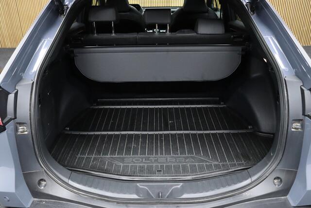 Subaru SOLTERRA Sky Package 71 kWh | Panoramadak | Adaptive-cruise | Trekhaak | 360° Camera | Navigatie | Elek. Achterklep | Leder | Stoel & Stuurverwarming | Apple Carplay & Android Auto | Keyless | Dodehoekdetectie