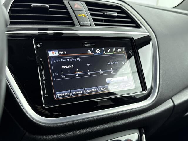 Suzuki S-Cross 1.0 Boosterjet Exclusive Stijl | Parkeersensoren V+A | Stoelverwarming | Trekhaak Afneembaar | Stootstrips |