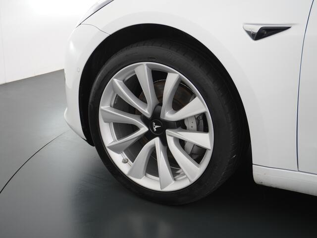 Tesla Model 3 RWD SR+ 60kWh 325PK Lmv 19" AutoPilot Leder PanoDak Adaptive-Cruise Lmv Camera's Elektr.-Stuur+Stoelen+Spiegels+Geheugen+Easy-Entry+Verwarmde stoelen Park assistent PDC WIFI Lane-Assist Speed-Assist Navi LED Comfortstoelen ACC DAB Keyless en Voorverwarmen