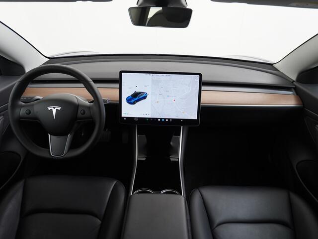 Tesla Model 3 RWD SR+ 60kWh 325PK Trekhaak FSD 3-Computer 18" AutoPilot Leder PanoDak Adaptive-Cruise Lmv Camera's Elektr.-Stuur+Stoelen+Spiegels+Geheugen+Easy-Entry+Verwarmde stoelen Park assistent PDC WIFI Lane-Assist Speed-Assist Navi LED Comfortstoelen ACC DAB Voor