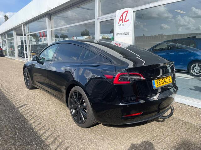 Tesla Model 3 | Long Range dual motor 485 km Actieradius | - 1e eigenaar | NAP | 4-WDRIVE -APK TOT 7 AUG 2027 | | 1e eigenaar | Navigatie | Panoramadak | Voorzien van trekhaak | Electronic climate control | Navigatiesysteem full map |