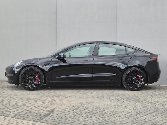 Tesla Model 3 Performance AWD 75 kWh / CCS snelladen / Stuur- Stoel & Achterbank verwarming / Panoramadak / Rondomzicht camera / Draadloze telefoon lader / Elektrische achterklep / Voorruit verwarming / Apple Carplay Android Auto / Lichtmetalen wielen 20" /