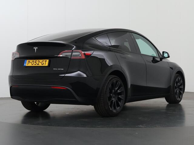 Tesla Model Y Long Range AWD 75 kWh | SOH 95% | Panoramadak | Lederen Interieur | Adaptieve Cruise Control | Camera | Dodehoek detectie | LED |
