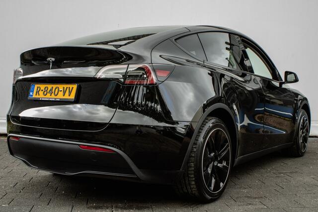 Tesla Model Y RWD 58 kWh Camera/ Leer/ Navigatie/ 19"/ Led/ Adapt. cruise/ Panoramadak