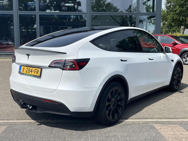 Tesla Model Y RWD 58 kWh AUTOPILOT | WIT LEDER | AFNEEMBARE TREKHAAK