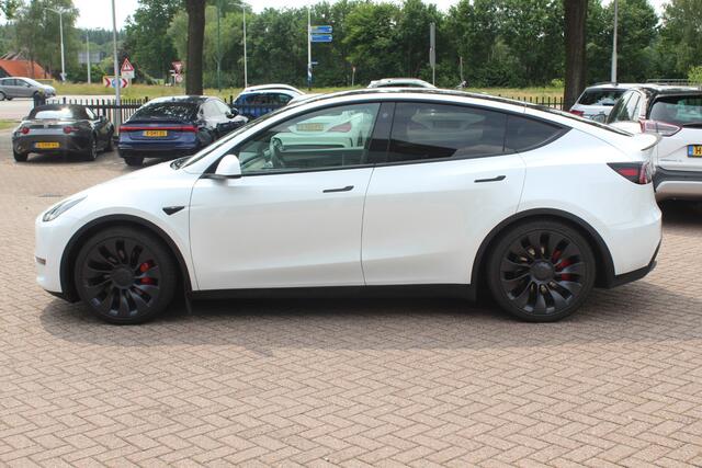 Tesla Model Y Long Range AWD 75 kWh / Autopilot / Panoramadak / Camera / 21'' / Keyless / Leder / Dodehoek / Navigatie / Stoelverwarming