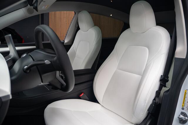 Tesla Model Y Long Range AWD 75 kWh Full Self driving 3 - warmtepomp - Cruise Controll Adaptief - 360 Camera - Wit leder