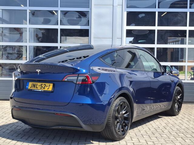 Tesla Model Y RWD 58 kWh | Navigatie | LM Velgen 20"| Voorstoelen/Achterbank/Stuur Verwarmd | Panoramadak | Achteruitrijcamera | Cruise Control | Airco |
