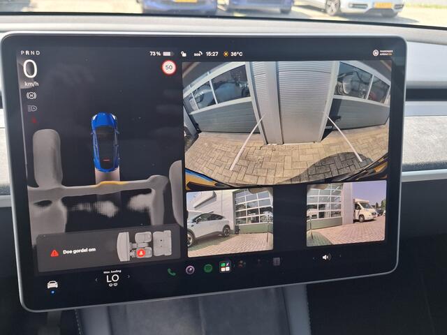 Tesla Model Y RWD 58 kWh | Navigatie | LM Velgen 20"| Voorstoelen/Achterbank/Stuur Verwarmd | Panoramadak | Achteruitrijcamera | Cruise Control | Airco |