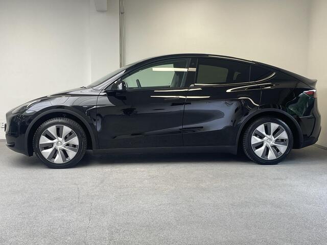 Tesla Model Y RWD 58 kWh | TREKHAAK | ORG.NL |