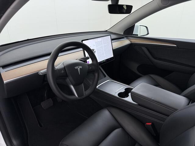 Tesla Model Y Long Range AWD 75kWh 514PK Warmtepomp Stuur+Stoel+Achterbankverwarming Panoramadak Camera's Adap.Cruise Navi Ecc Premium-Audio Leder SOH 91,4% 4WD Keyless Intel Atom®-Processor Privacy Glas Lmv Matrix Led Dodehoekdetectie