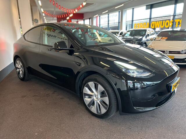 Tesla Model Y RWD 58 kWh Nederlandse auto | Panoramadak | Afneembare trekhaak | Stoelverwarming | Achteruitrijcamera | Parkeersensoren rondom | Lederen bekleding