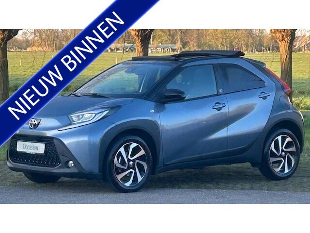 Toyota AYGO X 1.0 VVT-i S-CVT TEAM AIR AUTOMAAT 1E EIGENAAR!! CLIMATE CONTROL, APPLE CARPLAY, DAB RADIO, STOELVERWARMING, ELEC. VOUWDAK, ADAPTIVE CRUISE CONTROL, RIJBAAN ASSIST, ACHTERUITRIJCAMERA, PARKEEHULP V/A, LED LICHT, 17" L/M-VELGEN, ENZ. ENZ.