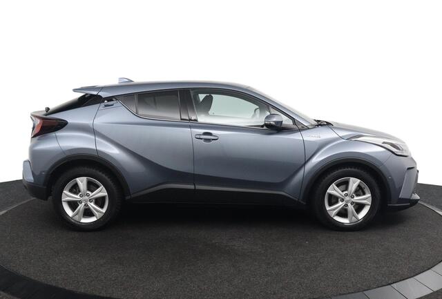 Toyota C-HR 1.8 Hybrid Business Plus | 18 Inch Zomerwielen aanwezig | Stoelverwarming | Trekhaak | Stuurwielverwarming | Dodehoek Detectie | Parkeersensoren Rondom |