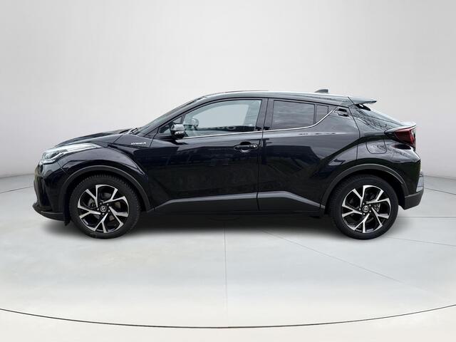 Toyota C-HR 1.8 Hybrid First Edition **NAVIGATIE/ DODEHOEK DETECTIE/ STOELVERWARMING/ GARANTIE**