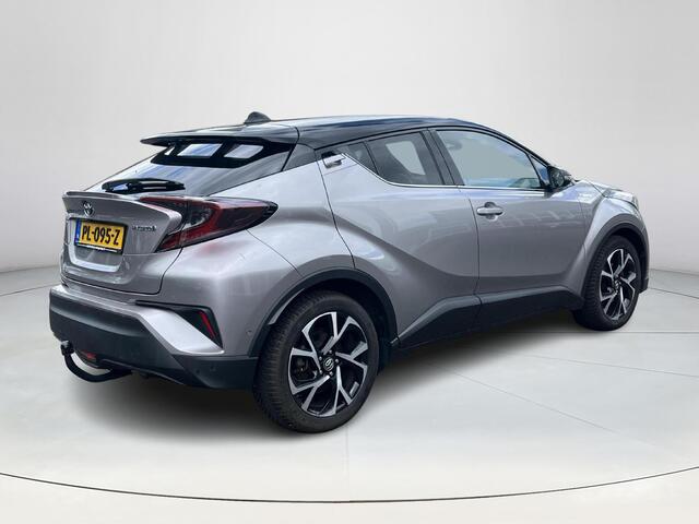 Toyota C-HR 1.8 Hybrid Bi-Tone Plus | Trekhaak | Lederen bekleding | JBL audio | LED koplampen |