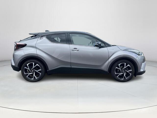 Toyota C-HR 1.8 Hybrid Bi-Tone Plus | Trekhaak | Lederen bekleding | JBL audio | LED koplampen |