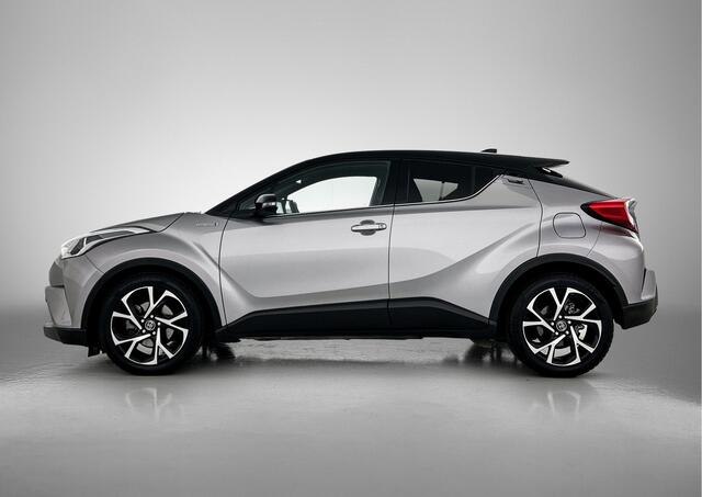 Toyota C-HR 1.8 Hybrid Bi-Tone Limited | Stoelverwarming | Camera | Adaptive cruise control | 18'' LM velgen |