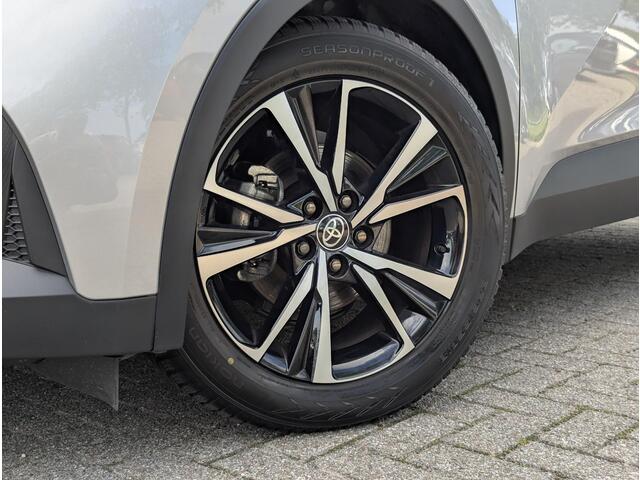 Toyota C-HR 1.8 Hybrid 140 First Edition | Bi-tone | Stoel- stuurverwarming | Elek. achterklep | Camera | PDC V+A
