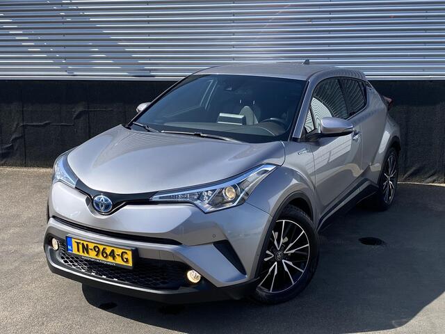 Toyota C-HR 1.8 Hybrid Bi-Tone Plus Trekhaak, dodehoek detectie, navigatie, stoel- & stuurverwarming, achteruitrij camera, parkeersensoren, lederen bekleding, Volledig dealeronderhouden