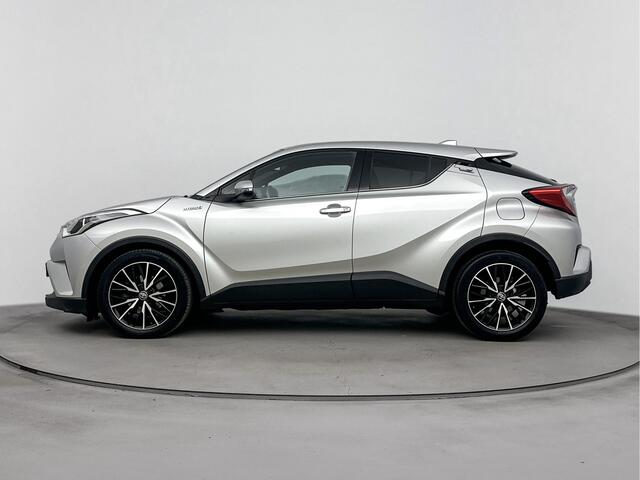 Toyota C-HR 1.8 Hybrid Dynamic Limited | Metaallak | Stoelverwarming | Parkeercamera | LM-Velgen | Donker Getinte Achterruiten |