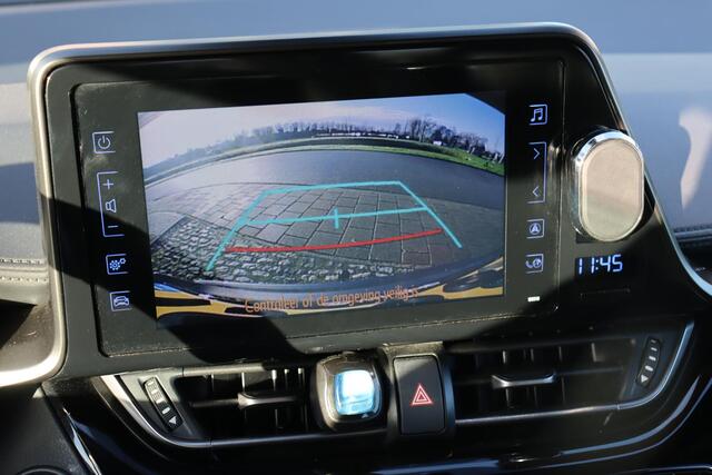 Toyota C-HR 1.8 Hybrid Active, Trekhaak, Airco, Cruise control Navigatie, Parkeercamera, Stuurwielbediening.
