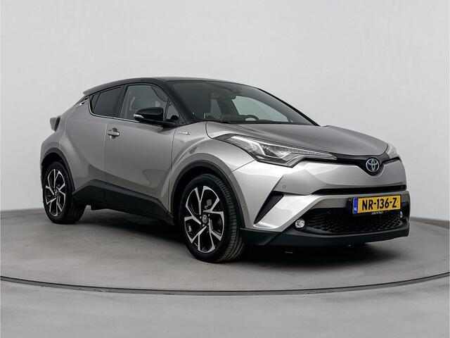 Toyota C-HR 1.8 Hybrid Bi-Tone Plus | Stuur en stoelverwarming | Dode hoeksensor | Navigatie