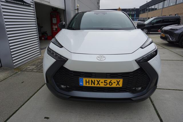 Toyota C-HR 2.0 Plug-in Hybrid 220 Dynamic |Navi|Carplay|PDC V+A|Dodehoek|E.a.klep|Stoel en stuur verw.|Camera|Bi-Tone|
