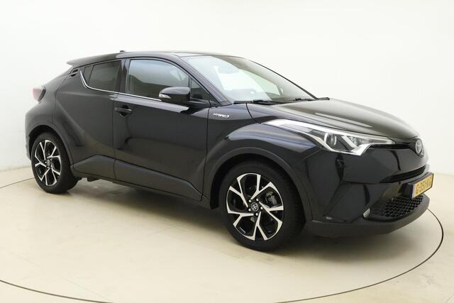 Toyota C-HR 1.8 Hybrid Executive | Navigatie | Climate Control | Stoelverwarming | Verwarmde voorruit | Verwarmd stuurwiel | Afneembare trekhaak | Camera | Keyless Entry & Start | Lederen bekleding
