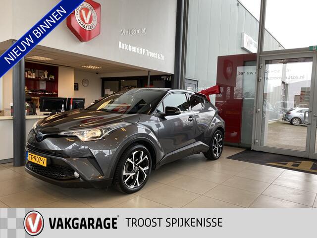 Toyota C-HR 1.8 Hybrid Bi-Tone,Automaat,Navigatie,Achteruitrijcamera,Climate&Cruisecontrol Adaptief,Trekhaak,Spraakbediening,Keyless,Stoelverwarming,V&A Sensoren,DAB,Dealer Onderhouden,18 Inch Lmv