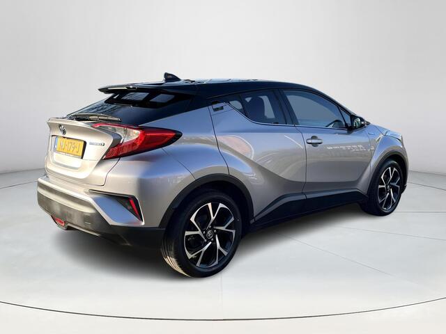 Toyota C-HR 1.8 Hybrid Bi-Tone | 1e eigenaar | Dealeronderhouden | Navigatie | 18 inch LM-velgen |