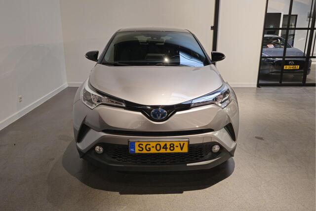 Toyota C-HR 1.8 Hybrid Style Bi-Tone - Stoelverwarming - Adaptive Cruise - Dodehoekdetectie - JBL Audio