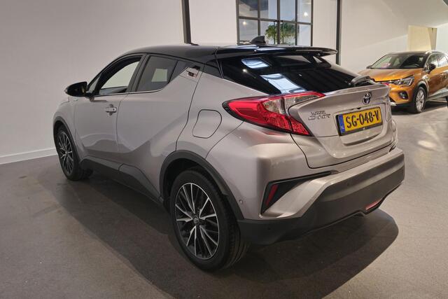 Toyota C-HR 1.8 Hybrid Style Bi-Tone - Stoelverwarming - Adaptive Cruise - Dodehoekdetectie - JBL Audio