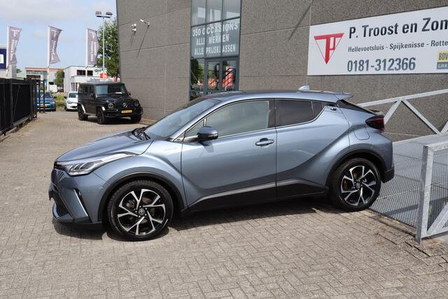 Toyota C-HR 1.8 Hybrid Business Plus Stoelverwarming/Achteruitrijcamera/JBL Audio/Navigatie/DAB/Bluetooth/Climate control/18 inch Licht metaal 2E PINKSTERDAG GEOPEND VAN 12:00 TOT 17:00 (ROTTERDAM&HELLEVOETSLUIS)