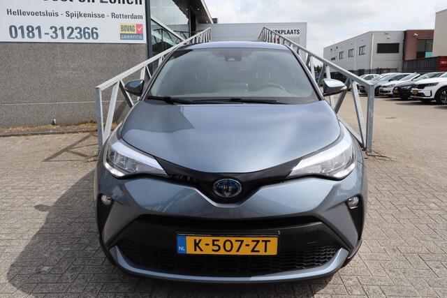 Toyota C-HR 1.8 Hybrid Business Plus Stoelverwarming/Achteruitrijcamera/JBL Audio/Navigatie/DAB/Bluetooth/Climate control/18 inch Licht metaal 2E PINKSTERDAG GEOPEND VAN 12:00 TOT 17:00 (ROTTERDAM&HELLEVOETSLUIS)