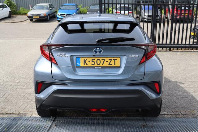 Toyota C-HR 1.8 Hybrid Business Plus Stoelverwarming/Achteruitrijcamera/JBL Audio/Navigatie/DAB/Bluetooth/Climate control/18 inch Licht metaal 2E PINKSTERDAG GEOPEND VAN 12:00 TOT 17:00 (ROTTERDAM&HELLEVOETSLUIS)