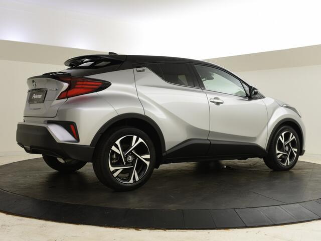 Toyota C-HR 1.8 Hybrid Bi Tone | lage km-stand | PDC | Navigatie | BLIS |