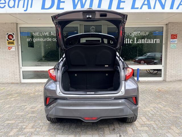 Toyota C-HR 1.8 Hybrid Style Navi Full Map/Keyless Entry/In Hoogte Verw. voorstoelen/Parkeersens. V+A./Dodehoek Detect./Cruise Contr. Adapt./Verw. elektr. inklapb. buitenspiegels/Audio Install. Premium/Mistlampe Voor