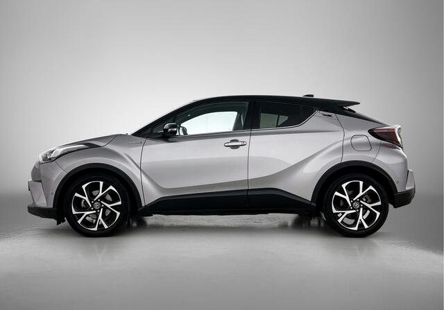 Toyota C-HR 1.8 Hybrid Bi-Tone Plus | Dealer onderhouden | Trekhaak afneembaar | Stoel+stuurverwarming | JBL | Dodehoek detectie | Parkeersensoren voor+achter met assistent | FULL LED verlichting | Climate Control |