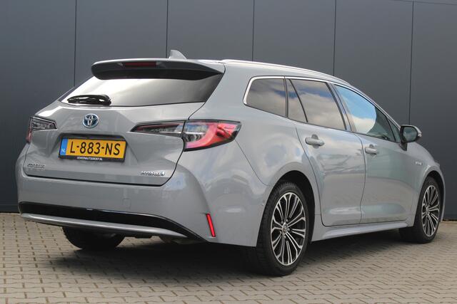 Toyota COROLLA Touring Sports 1.8 Hybrid Executive | incl. 12 maanden garantie | Dodehoek detectie | Camera | Stoelverwarming | Navigatie | Sportstoelen | Zwarte hemel | LED | DAB+ | Draadloze telefoonlader | Climate control | 17" lmv | Parkeersensoren V+A | Head up dis