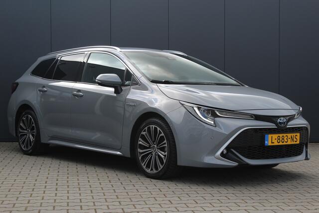 Toyota COROLLA Touring Sports 1.8 Hybrid Executive | incl. 12 maanden garantie | Dodehoek detectie | Camera | Stoelverwarming | Navigatie | Sportstoelen | Zwarte hemel | LED | DAB+ | Draadloze telefoonlader | Climate control | 17" lmv | Parkeersensoren V+A | Head up dis